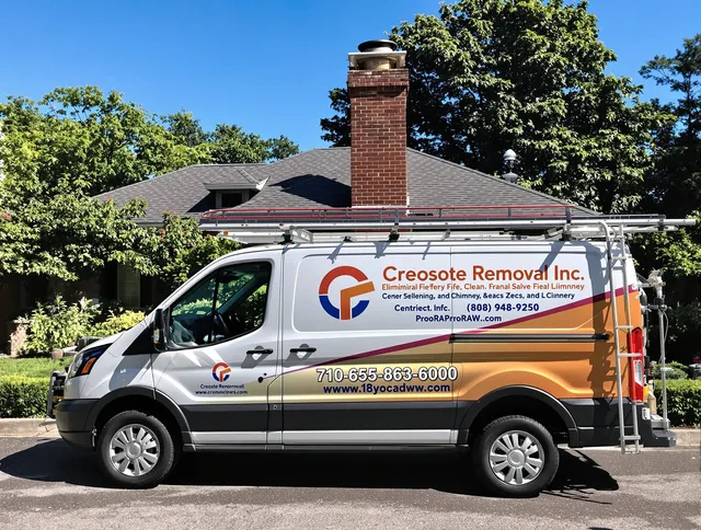 Naugatuck Chimney Sweep technician removing creosote safely in Naugatuck, CT