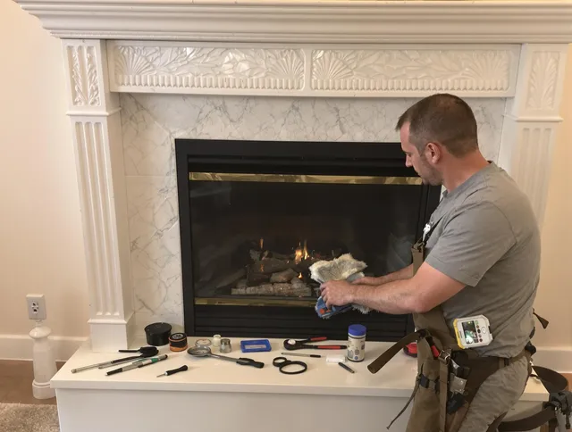 Naugatuck Chimney Sweep performing fireplace maintenance in Naugatuck, CT